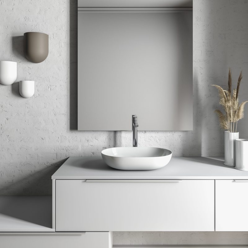 Temal kylpyhuone, jossa rauhallinen tunnelma, harmaa Design-kaluste, valkoinen Aatos-allas, emaliallas, upea valo,